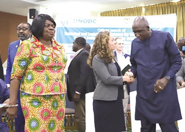 Ambrose Dery (right), Minister for the Interior, in an interaction with Chris Carlisle (2nd from left), Director, International Narcotics and Law Enforcement Affairs, Embassy of the US in Ghana, after the launch. With them is Adelaide Anno-Kumi (left), Chief Director, Ministry of the Interior. Picture: EDNA SALVO-KOTEY