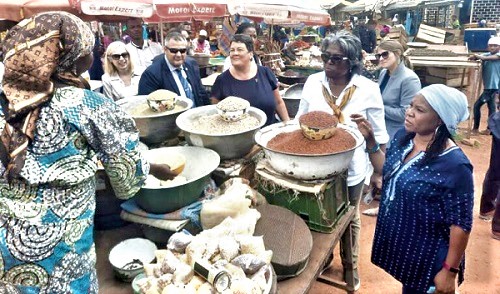 Linda Thomas-Greenfield (2nd from right) interacting with some grain sellers at the Aboabo Market in Tamale