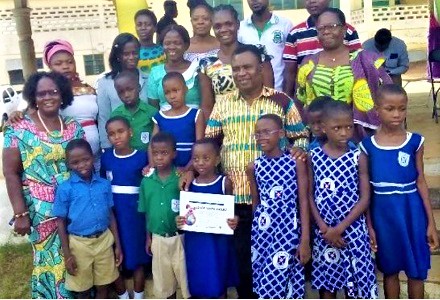 Pupils, teachers and officials of the Lower Manya Krobo Municipal Directorate of the GES after the programme