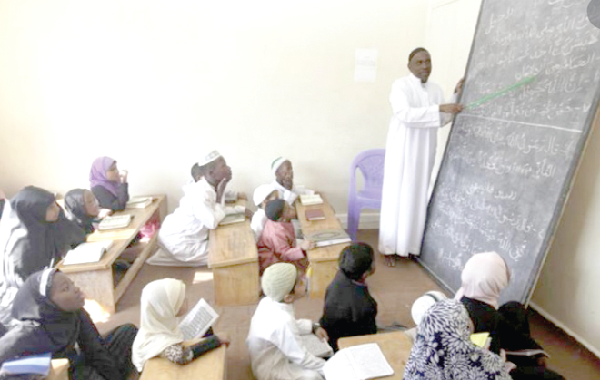  Pupils being taught in a classroom