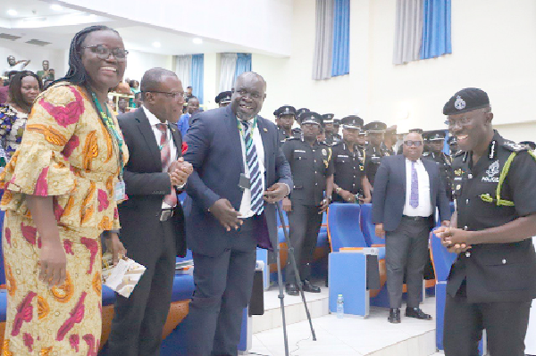 Dr George Akuffo Dampare (right), the IGP, walking up to Prof. Rita Akosua Dickson (left), Vice-Chancellor, KNUST; Prof. Ellis Owusu-Dabo, the Pro Vice-Chancellor, KNUST, and Prof. Charles Ofosu Marfo, Provost, College of Humanities and Social Sciences, KNUST. Picture: EMMANUEL BAAH