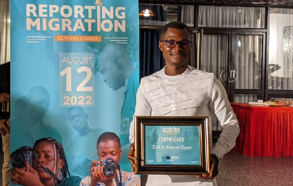 Zadok Kwame Gyesi with his citation