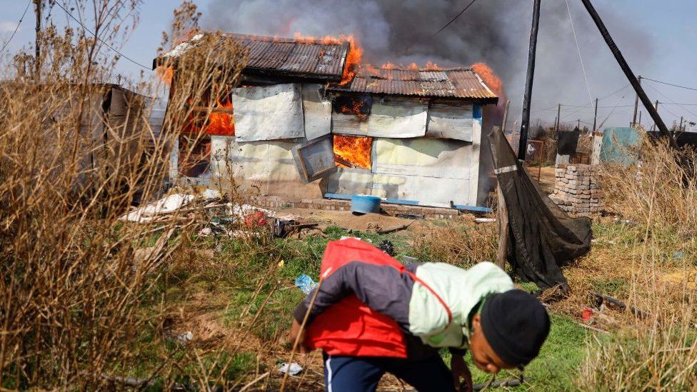 The homes belonging to people suspected of being in the country illegally were set alight