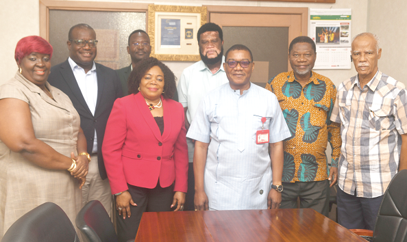 Kobby Asmah (middle), Editor, Graphic with Sylvester Parker-Allotey (2nd from right), Head of Communication and Protocol, Justice Julia Naa Yarley Sarkodie-Mensah (2nd from left,) Chief of Staff, both at the Office of the Ga Mantse, and other members of the delegation and officials of Graphic 