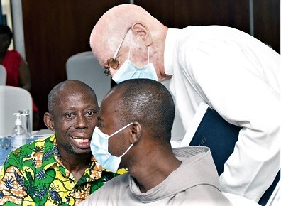  Kofi Nyarko (seated left), a cured leper, interacting with Fr Andrew Campbell during the national stakeholders’ meeting on Leprosy Contact Tracing and Post-Exposure Prophylaxis Guidelines. Picture: EBOW HANSON