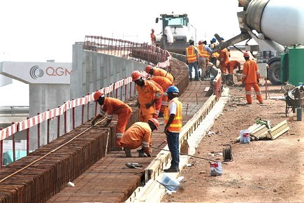 Construction staff working on the edge beams. Picture: Maxwell Ocloo