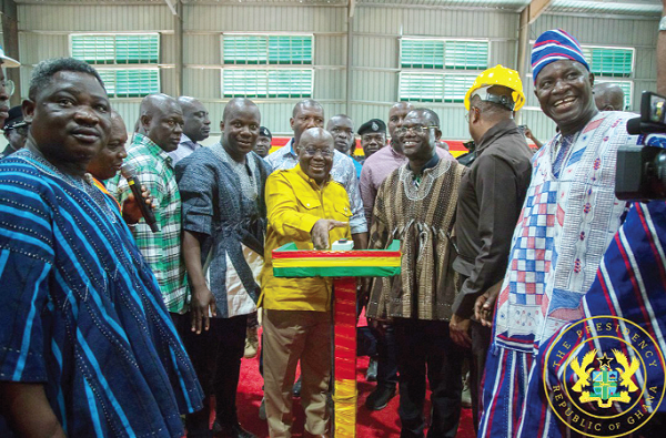 President Akufo-Addo, flanked by Samuel Abu Jinapor, MP for Damongo and Minister of Lands and Natural Resources, and Dr Joseph Siaw Agyepong, the Chairman of the JGC, commissioning the compost plant (right)