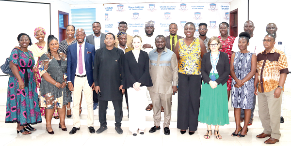 Abdourahamme Diallo (4th from left), Representative, UNESCO, with Daniela d’Orlandi (5th from left), Italian Ambassador to Ghana; Albert Kwabena Dwumfuor (5th from right), President, Ghana Journalists Association; Giulia Piccioni (3rd from right), Project Development and Donor Liaison Officer, IOM Ghana; Ama Serwah Nerquaye-Tetteh (4th from right), Secretary-General, Ghana Commission for UNESCO, and some of the participants in the forum. Picture: ELVIS NII NOI DOWUONA