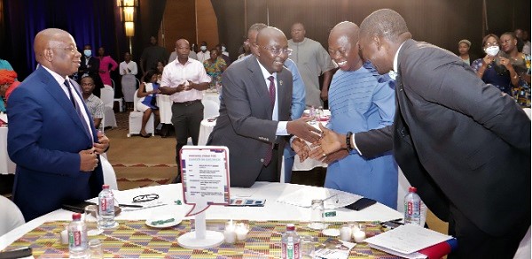 Vice-President Dr Mahamudu Bawumia (2nd from left), with the Governing Board of NHIA, during the ceremony. With him are Kwaku Agyeman-Manu (left), Minister of Health, and Dr Bernard Okoe Boye (right), CEO, NHIA. Picture: Samuel Tei Adano