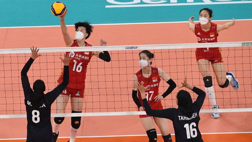 Chinese outcry after volleyballers wear N95 masks during match