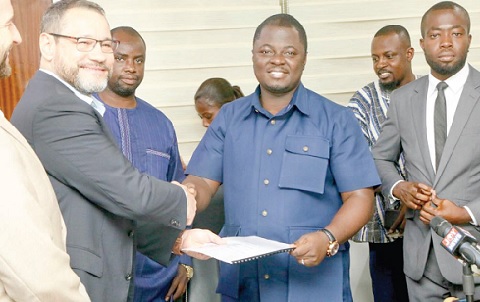 Kofi Baah Agyepong (right), CEO of YEA, and Fernando Mariano, Country Manager of INZAG Germany,  in a handshake after signing the MoU
