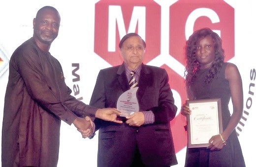 James Asare Adjei (left),  past President of AGI, presenting the best pharmaceutical award to Gopal Vasu, CEO of M&G Pharmaceuticals Company Limited