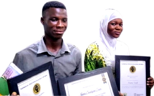 James Saakyene Saae(left), Overall Best Graduating Student, and Asana Issah, Best Graduating student in Mathematics, showing their awards. 