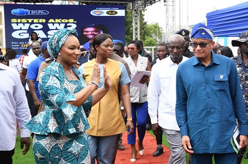 Samira Bawumia, second Lady (left) responding to cheers from some of the participants after the official launch of the LPG awareness campaign. With her is Dr Mustapha Abdul-Hamid (right), Chief Executive of NPA. Picture: EBOW HANSON