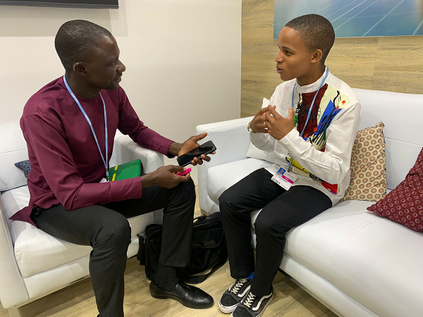 Timothy Ngnenbe (left), the Daily Graphic Reporter, interviewing Sibusiso Mazomba, the youngest negotiator at COP27