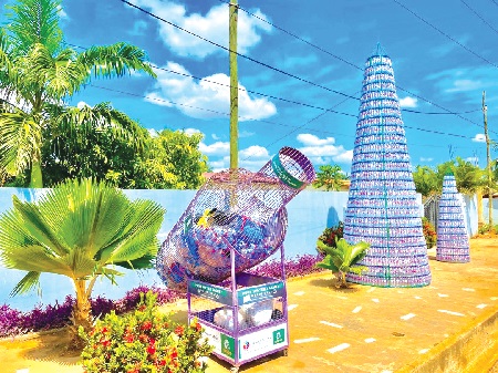 A set-up of Christmas trees made from recycled plastic bottles and other decorations at a Geodrill site in the Ashanti Region