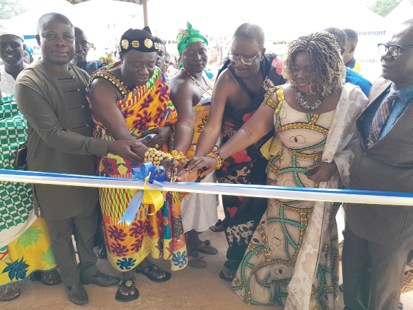  Mawusi Nudekor Awity (2nd from right), Director-General of the Technical and Vocational Education and Training, being assisted by Obrempong Kwasi Amo Tweretwie II (2nd from left), Abiremhene, and Nana Dr Boni Abankro (3rd from right), Aduasenahene, to inaugurate the new building. Looking on are some dignitaries