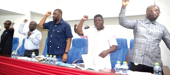 Members of the Ghana Mine Workers Union and invited guests chanting at the national executive council meeting in Accra