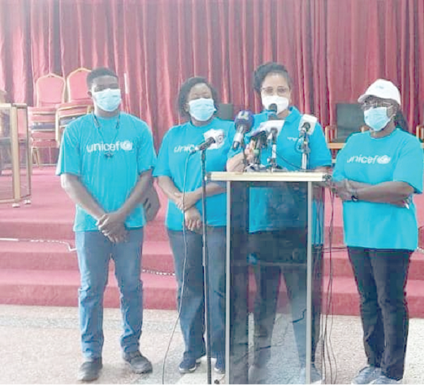 Charity Nikoi (2nd from right), Social and Behaviour Change Officer, UNICEF Ghana, and her team, addressing the programme.