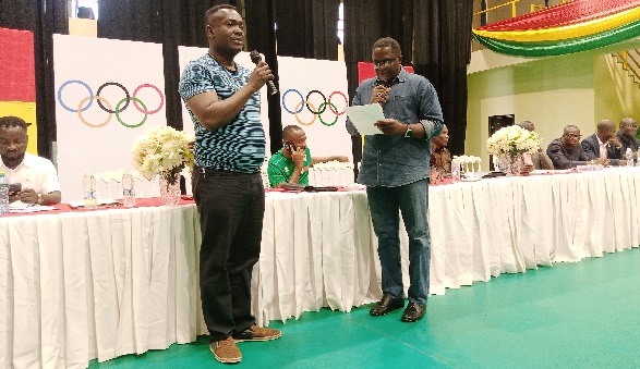 Mr Mawuko Afadzinu (left) reciting the oath of office after Mr Ben Nunoo Mensah