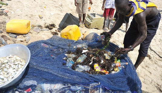  A fisherman’s net filled with plastic waste