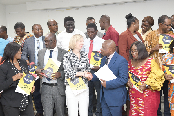  Kwaku Agyeman-Manu (2nd from right), Minister of Health, in a discussion with Kimberly Rosen (middle, front row), USAID Mission Director;  Dr Mrs Martha Ghansa-Lutterrodt (right), Director of Pharmaceutical Services, and some stakeholders. Picture: EBOW HANSON