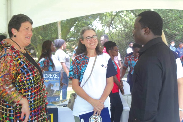 Ambassador to Ghana Virginia Elliott (left) and Deputy Minister of Education Reverend John Ntim Faujour (right) interacting after the launch.Photo: Esther Ajorkol Adjay