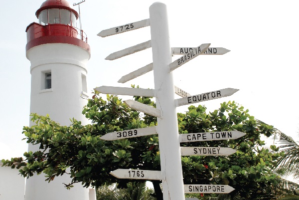 The directional and nautical milage of countries at the light house at Cape Three Points