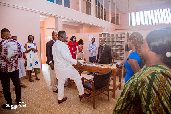    The Acting Managing Director of Ghana Post, Mr Bice Osei Kuffour popularly called Obour (in white attire), interacting with the staff of the company at Sunyani