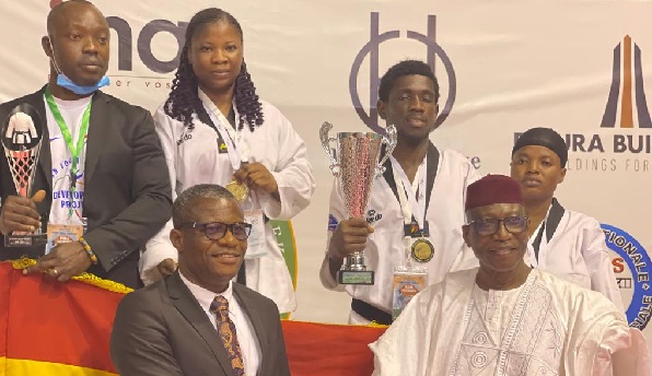 Mr Frederick Lartey Otu (left) being congratulated by Mr Ide Issaka, Preesident of the African Taekwondo Union after his appointment