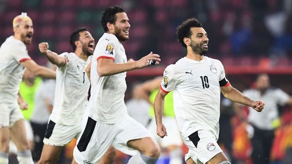 Egypt captain Mohamed Salah leads his teammates to celebrate their 3-1 shootout victory over the host team yesterday.