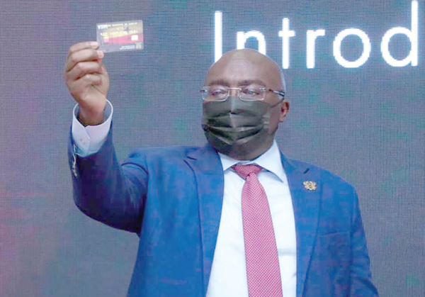Dr Mahamudu Bawumia displaying a sample of the E-travel card