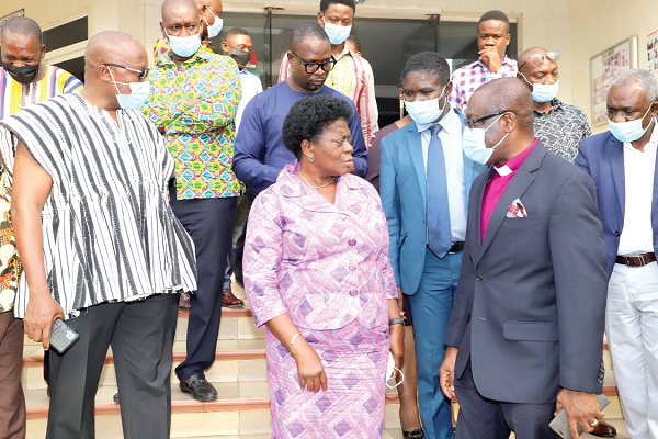 Rev. Dr Ernest Adu-Gyamfi (2nd from right), Chairman of the National Peace Council, interacting with Ms Adelaide Anno-Kumi (3rd from left), Chief Director of the Ministry for the Interior, after the meeting in Accra. With them are Mr George Amoh (3rd from right), Executive Secretary of the National Peace Council, and other officials. Picture: GABRIEL AHIABOR
