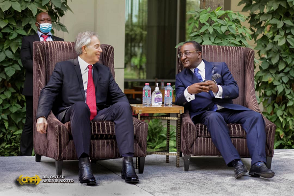 Dr Owusu Afriyie Akoto (right) Agric Minister, conferring with Mr Tony Blair, a former Prime Minister of the United Kingdom