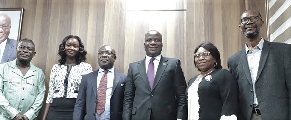 Mr Samuel Abu Jinapor (3rd from right), Minister of Lands and Natural Resources, with members of the five-member technical committee to review health and safety standards in the mining industry after the meeting. Picture: EDNA SALVO-KOTEY