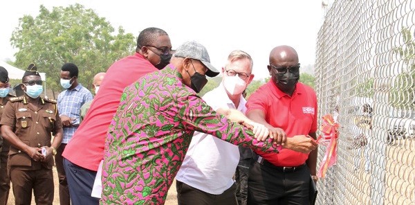 Mr Sam Okudzeto (in cap) being assisted by Mr Felix Quansar (right) and Mr Wiesel Rafael (second right) to inaugurate the solar and water pumping system. Looking on is DOP Hanson Awuku. Picture: DELLA RUSSEL OCLOO.