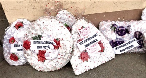Some of the wreaths left at the entrance of the BOST head office in Accra