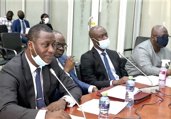  Mr Ramses Cleland (left), acting Chief Director of the Ministry of Foreign Affairs and Regional Integration, answering questions before the PAC in Accra. Those with him are Mr Kwaku Ampratwum-Sarpong (2nd from left), Deputy Minister of Foreign Affairs and Regional Integration; Mr Solomon Wemegah (2nd from right), Director, Inspectorate and Internal Audit, and Mr Kingsford Amoako (right), Director of Finance, both of the Ministry of Foreign Affairs and Regional Integration. Picture: GABRIEL AHIABOR