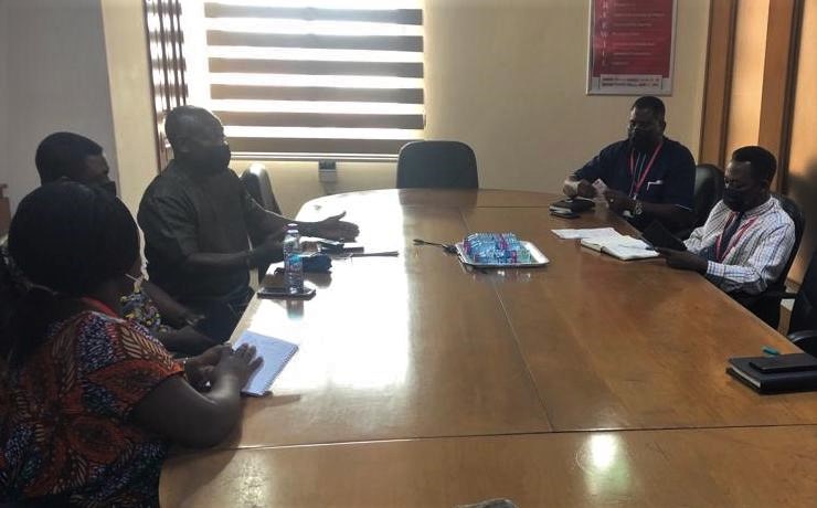 Mr Tony Mensah-Abrampah (3rd from left), the Country Director of Praxis Africa, speaking at the meeting. With him is Mr Franklin Sowa (2nd from right), Director, Marketing and Sales, GCGL, and other officials Picture:  Joshua Bediako Koomson