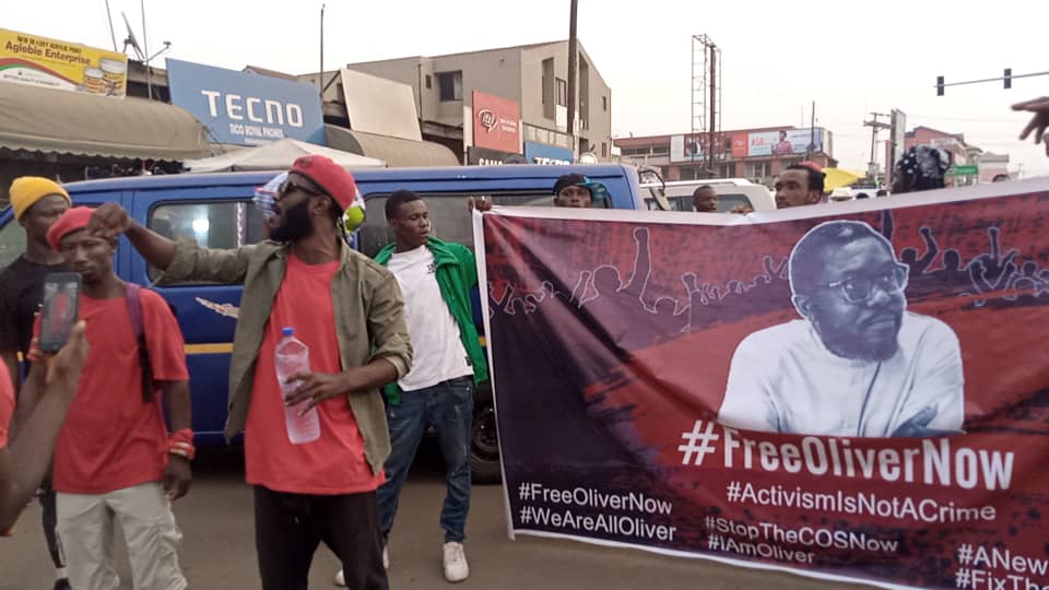 Some members of the #FixTheCountry movement holding a banner calling for the release of their colleague 