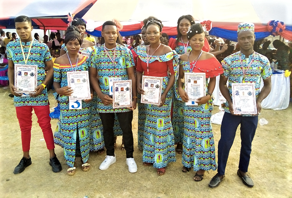 The graduands with their certificates