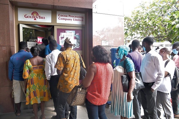 People in a long queue to buy chocolate at the Head Office of COCOBOD in Accra yesterday. Picture: Emmanuel Quaye 