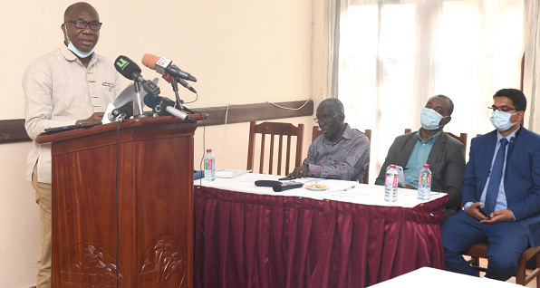 Mr Donnan Tay (left), Director, Water, Ministry of Sanitation and Water Resources, reading a speech on behalf of Ms Cecilia Abena Dapaah, the sector Minister 