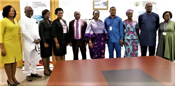 Mrs Ursula Owusu-Ekuful (5th from right),  the Minister of Communications and Digitalisation, with the new board members