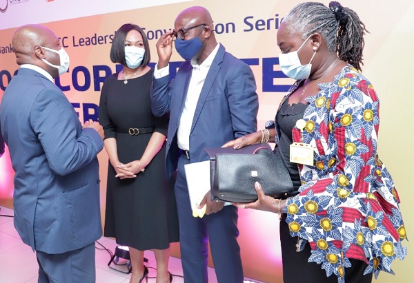 Mr Philip Owiredu (left), MD, CalBank, interacting with Mr Reggie Mark-Hansen (2nd from right), HR-Business Professional and Executive Coach, after the meeting. With them are Ms Adjoba Kyiamah (right), Executive Director, UKGCC and Mrs Catherine Engmann (3rd right), Head, Sirdar Ghana Limited. Picture: SAMUEL TEI ADANO