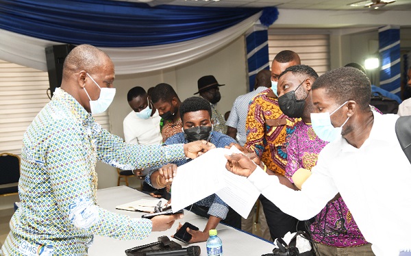 Dr John Amaglo (left), President of the Ghana Institution of Surveyors, interacting with media personnel after the launch of the 17th Surveyors Week and the 53rd Annual General Meeting of the Institution. Picture: EBOW HANSON