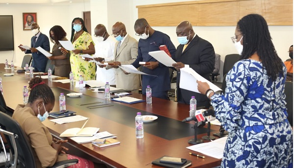 Mrs Ursula Owusu-Ekuful (right), Minister of Communications and Digitalisation, swearing in the Ghana-India Kofi Annan Centre of Excellence in ICT board