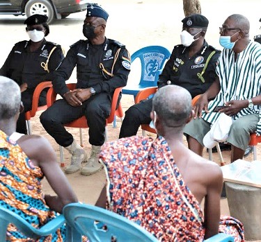 Dr George Akuffo Dampare (2nd from right), IGP, and his men interacting with some traditional leaders during the tour