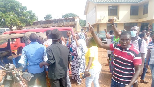 Angry NPP members pursuing Yaw Bonna Boadi, the Kwadaso Constituency Chairman of the party, at the Suntreso Police station for nomination forms.