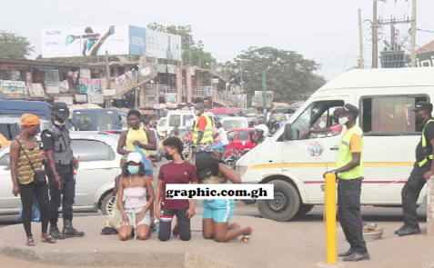 Flashback: April 2021, Madina Zongo Junction, a policeman making people, caught crossing the N4 at unauthorised places, kneel